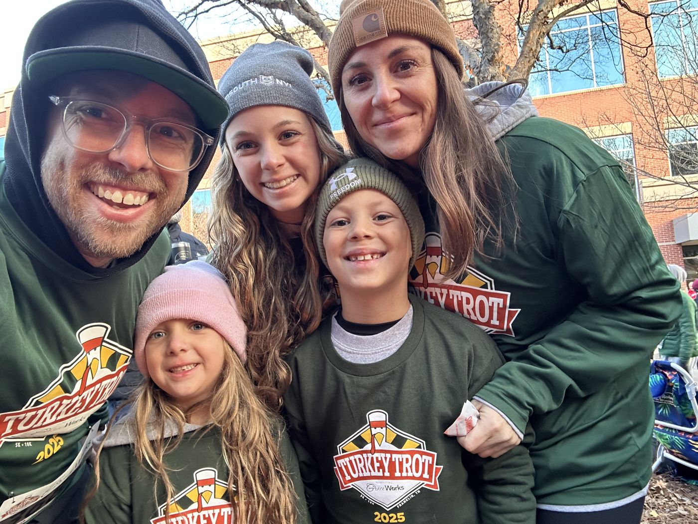 Aaron with family at the 2025 Franklin Turkey Trot